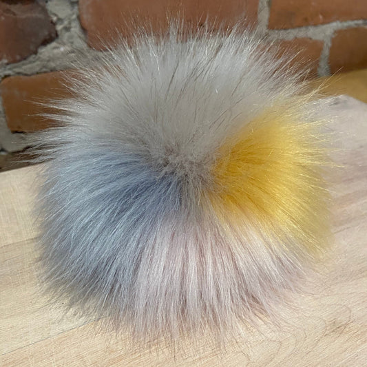 Handmade Artist Pom Pom, in blue, grey, yellow and pink