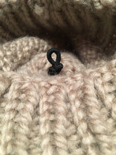 Load image into Gallery viewer, Hat Pom Pom Elastic Loop Attachment Knot Shown on the Inside of Knit Hat
