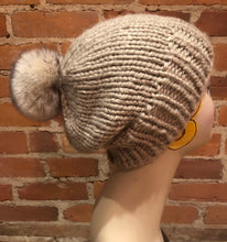 Load image into Gallery viewer, Beige and Black Pom Pom on Beige Winter Knit Hat, Side View
